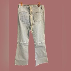 Flared jeans with lace up back